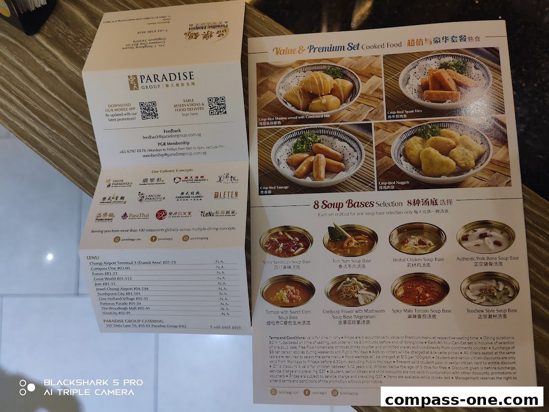 A menu from Paradise Hotpot featuring value and premium cooked food sets and soup bases.