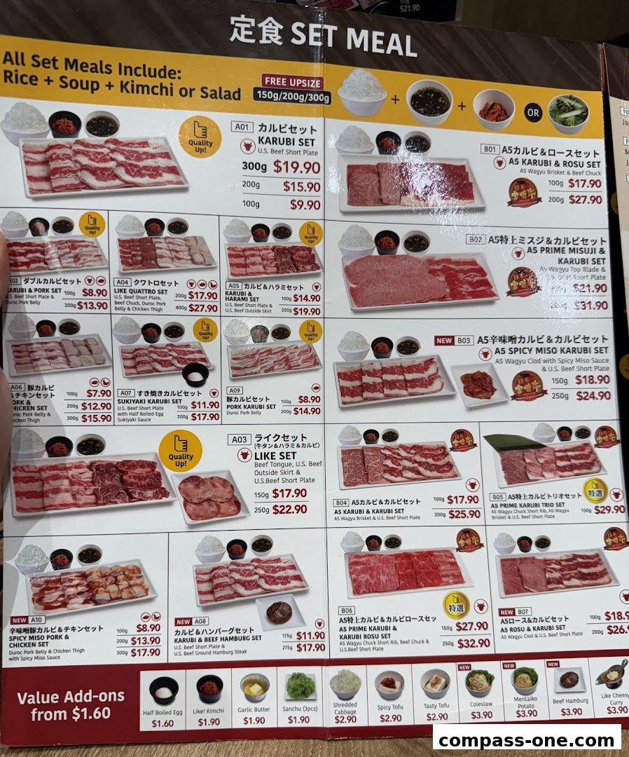 A menu for Yakiniku Like Compass One, showcasing various set meals with beef and pork options.