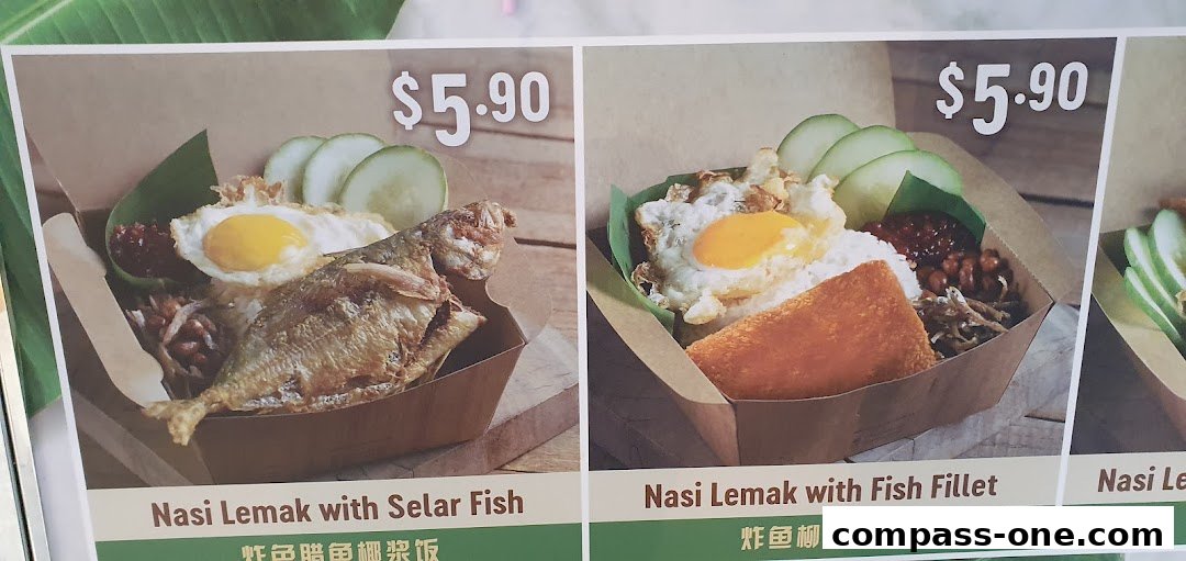 Close-up of two Nasi Lemak dishes with prices and names.