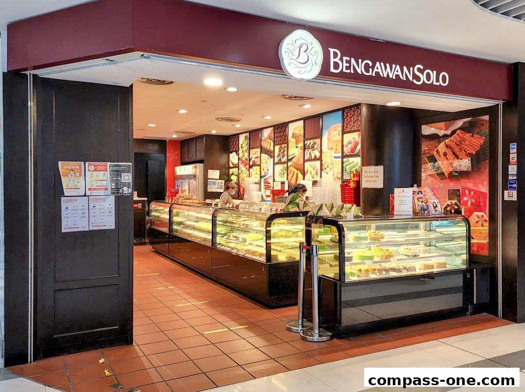 The exterior of Bengawan Solo, a bakery showcasing a wide variety of cakes and pastries in display cases.