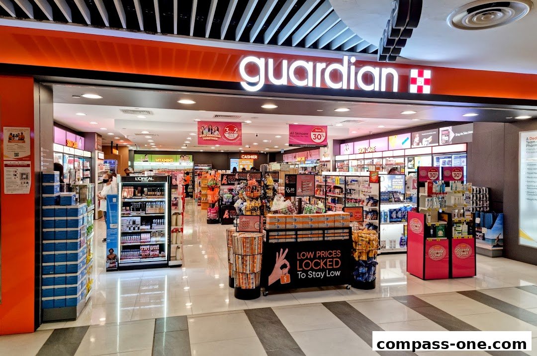 The entrance and interior of a Guardian Health & Beauty pharmacy with various products displayed.
