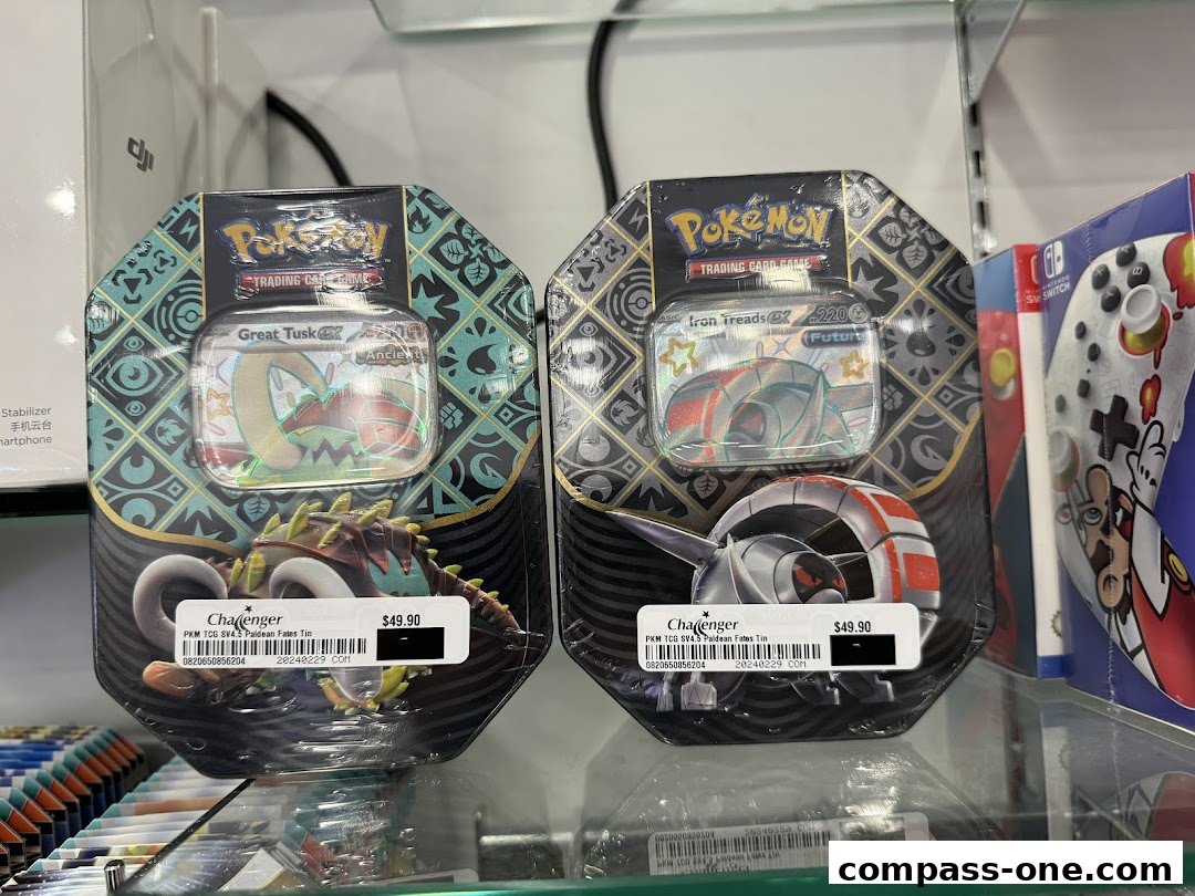 Pokemon trading card game tins featuring Great Tusk and Iron Treads, priced at $49.90 each.
