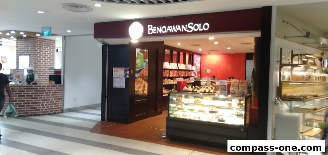 The entrance of Bengawan Solo, a shop displaying cakes and pastries in a display case.