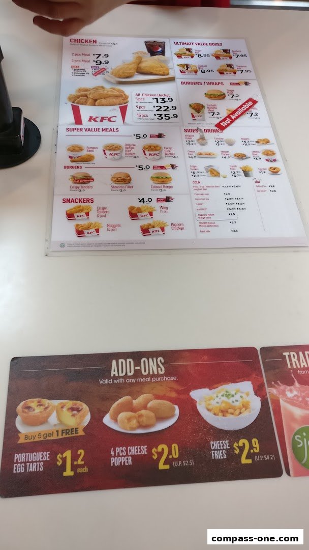 A KFC menu displaying chicken meals, burgers, snacks, sides, drinks, and add-ons.