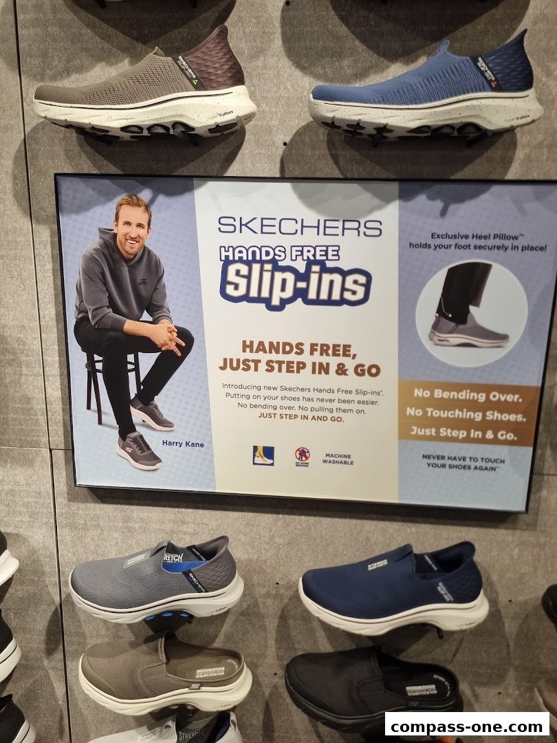 Skechers Hands Free Slip-ins shoes are displayed with a promotional sign featuring Harry Kane.