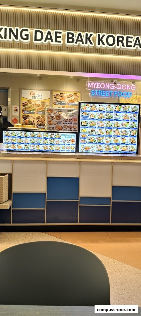 Digital menus displaying a wide variety of Korean street food dishes.