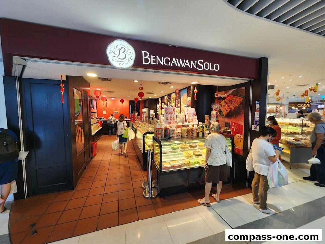 The Bengawan Solo shop displays cakes and pastries in a well-lit interior with customers browsing.