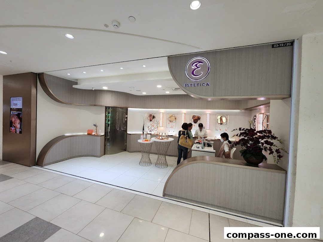 The Estetica Beauty shop front with customers and staff inside, showcasing products.