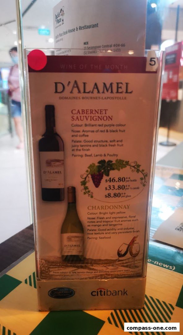 A menu display for Jack's Place featuring D'Alamel Cabernet Sauvignon and Chardonnay.