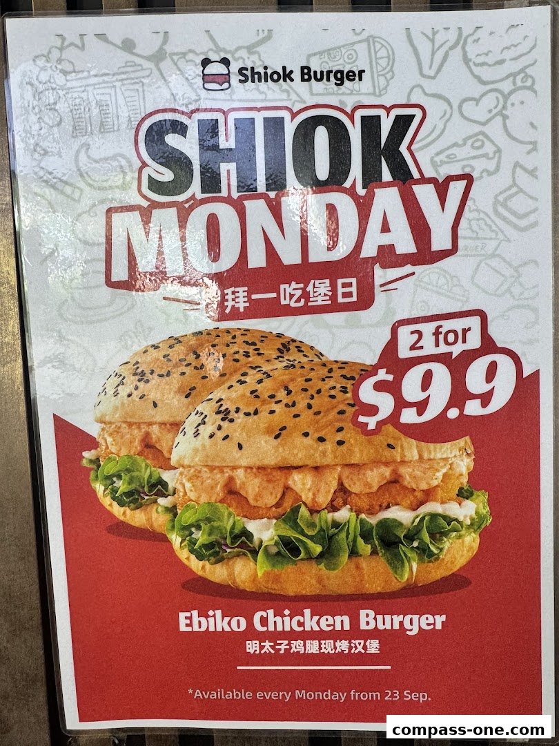 Shiok Burger advertises a special deal for Ebiko Chicken Burgers on Mondays.
