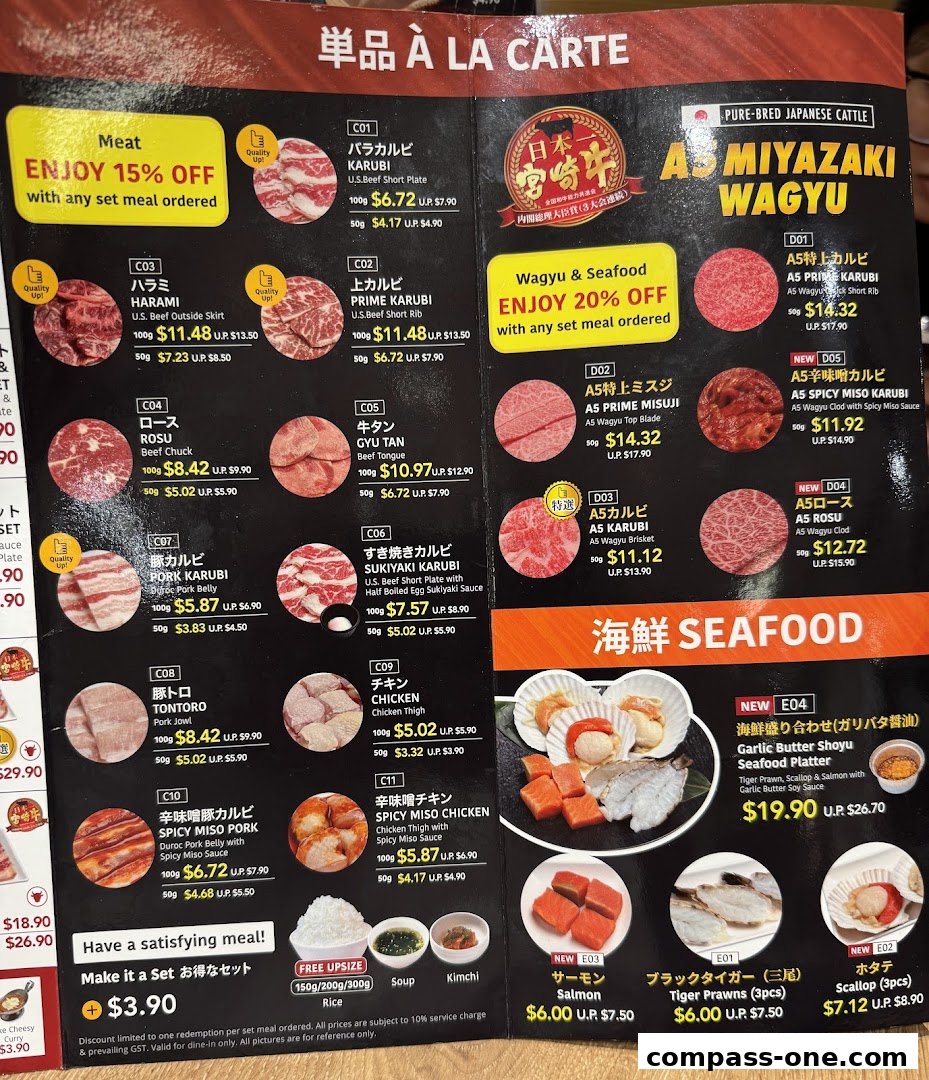 A menu for Yakiniku Like Compass One, featuring various meat and seafood options with prices.