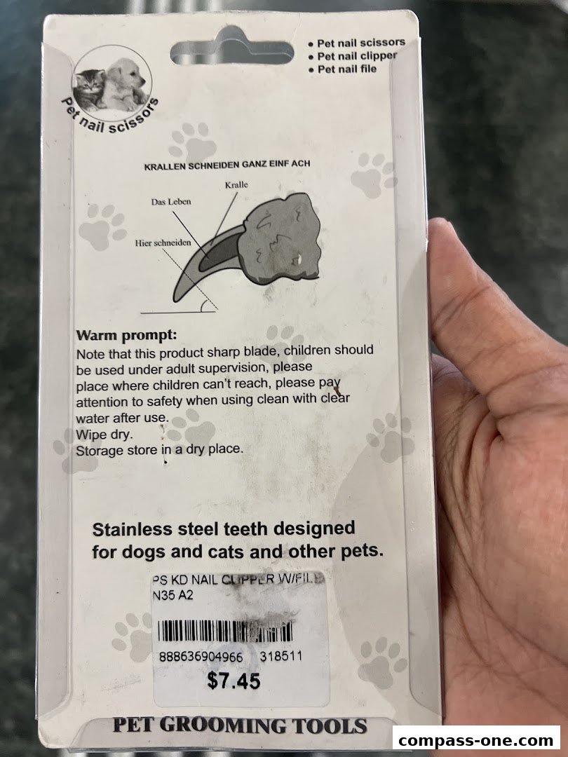 Packaging for pet grooming tools, specifically nail clippers with a file.