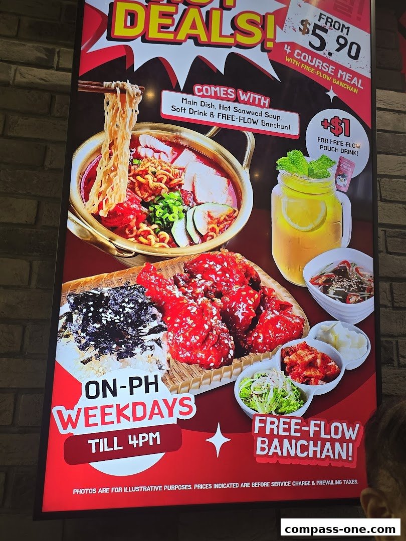 A vibrant advertisement for Korean street dining deals, featuring a meal with free-flow banchan.