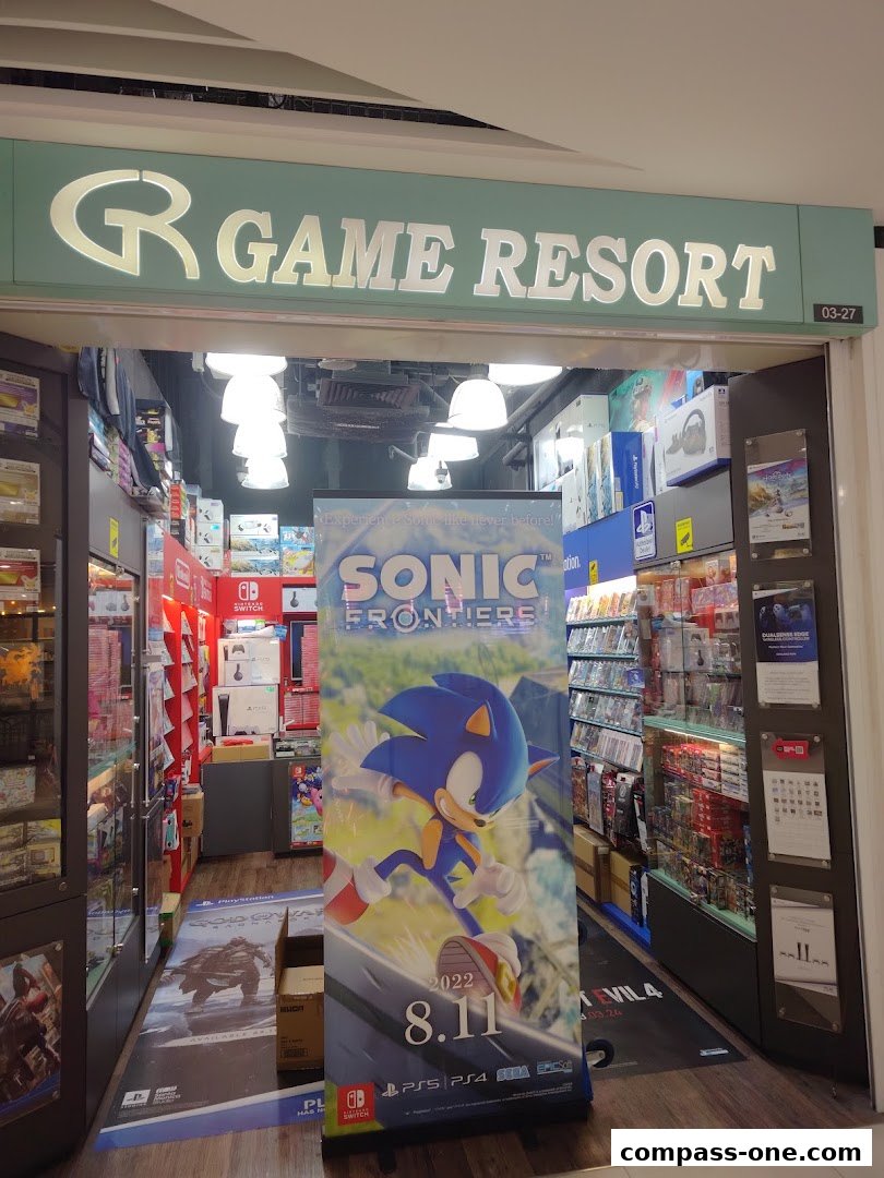 The entrance of Game Resort, a shop selling video games and consoles, featuring a Sonic Frontiers banner.