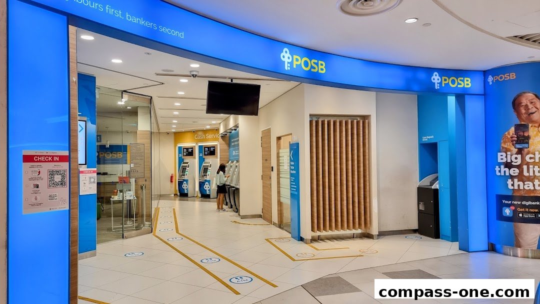 Entrance to a POSB bank branch with ATMs and a check-in station.