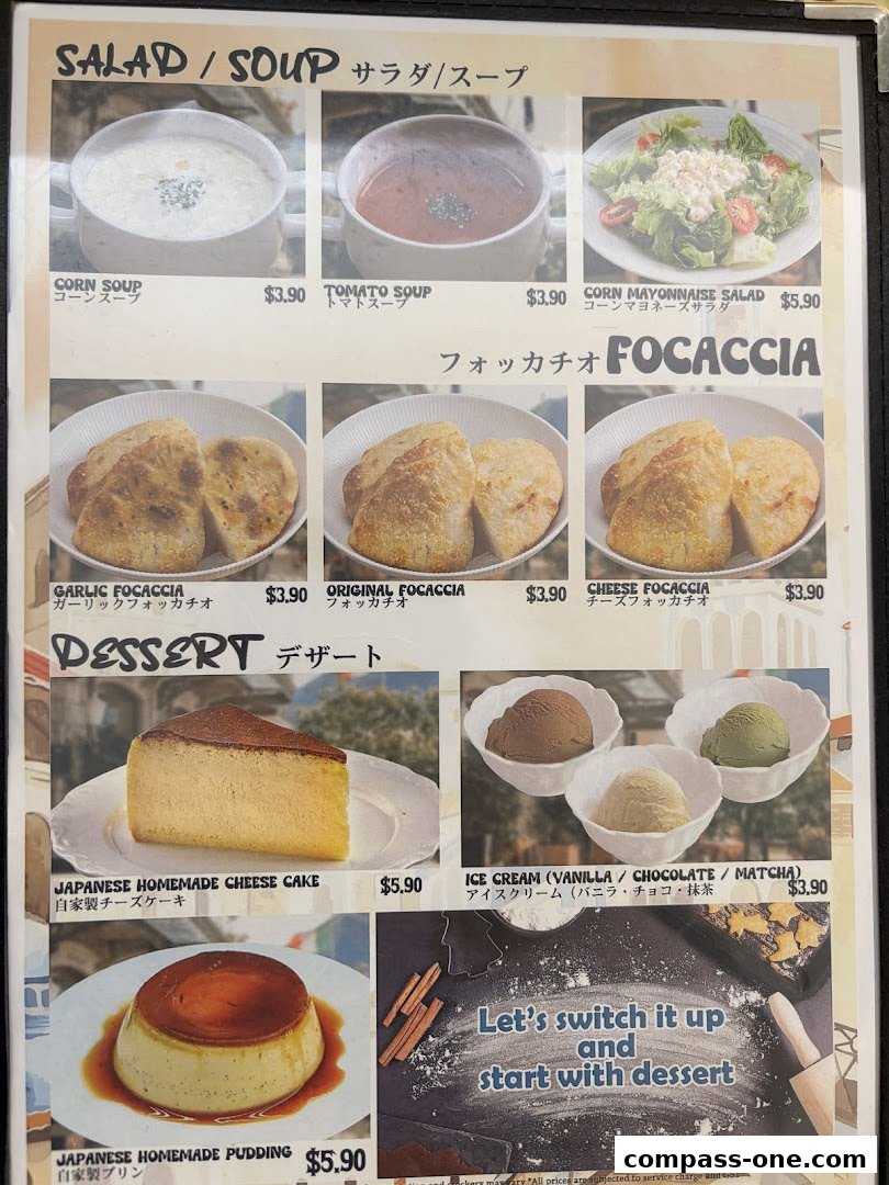 A menu featuring salads, soups, focaccia, desserts, and ice cream with prices.