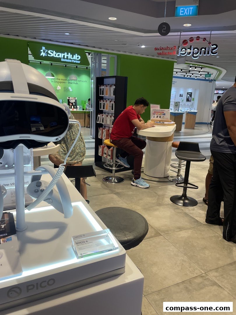A retail store interior showcasing VR headsets and a StarHub exclusive partner section.