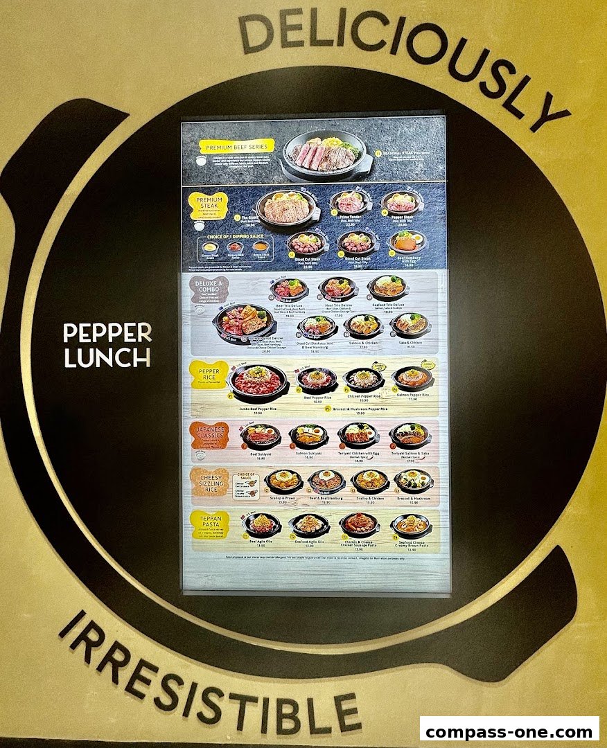 A menu board for Pepper Lunch featuring various sizzling hot plate dishes and rice bowls.