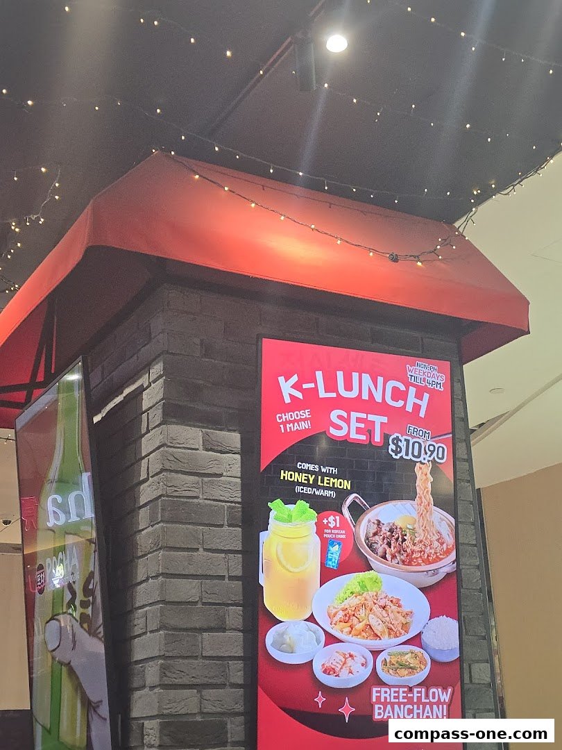 A promotional poster for a Korean K-Lunch Set with free-flow banchan.