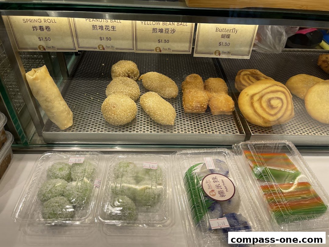 A display of various traditional Asian snacks and pastries at Jian Bo Shui Kueh.