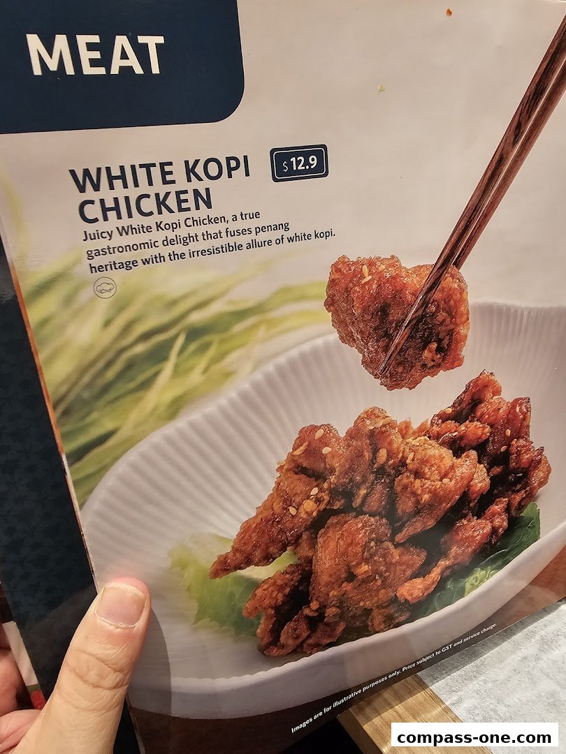 A menu item featuring White Kopi Chicken with a price of $12.9.