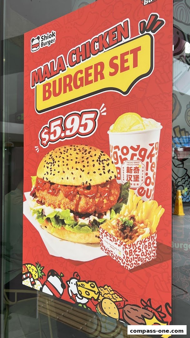 A poster advertising Shiok Burger's Mala Chicken Burger Set for $5.95.