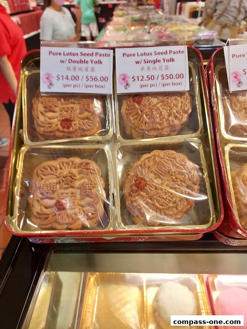A display of traditional mooncakes with lotus seed paste filling.