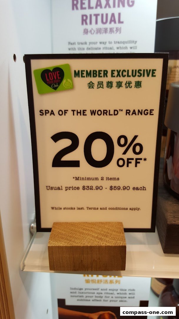 A sign advertises a 20% off member exclusive deal on the Spa of the World range.