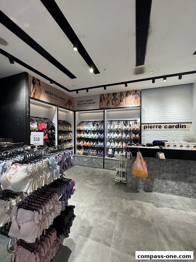 Interior of a Pierre Cardin lingerie store showcasing a wide selection of bras and underwear.