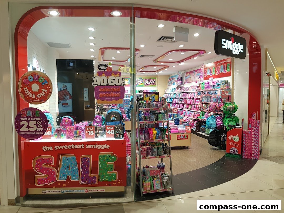 The brightly lit Smiggle store showcases a vibrant sale with colorful stationery, bags, and accessories.