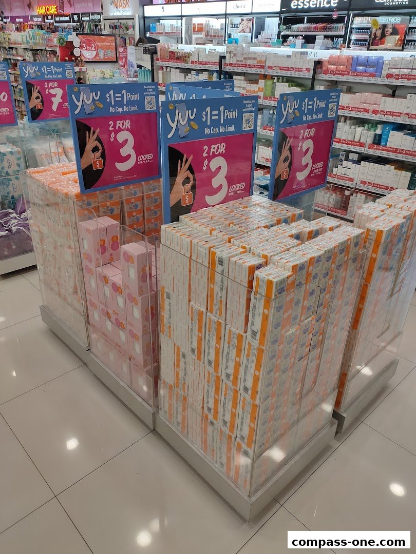 Promotional display for a health and beauty store featuring tissue products and a loyalty program.
