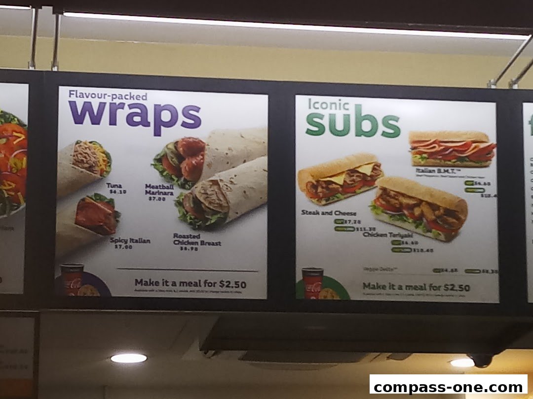 A menu board displaying various wraps and subs offered at Subway.