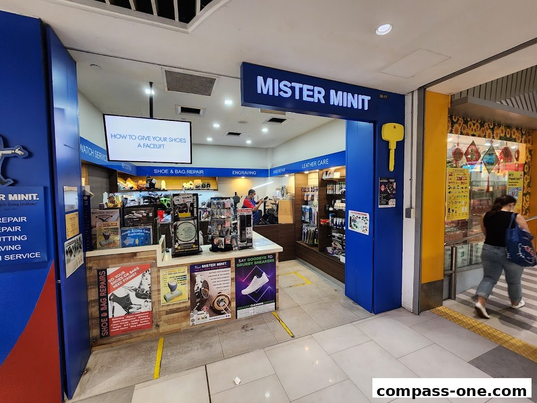 The Mister Minit shop front offers shoe and bag repair, watch service, engraving, and leather care.