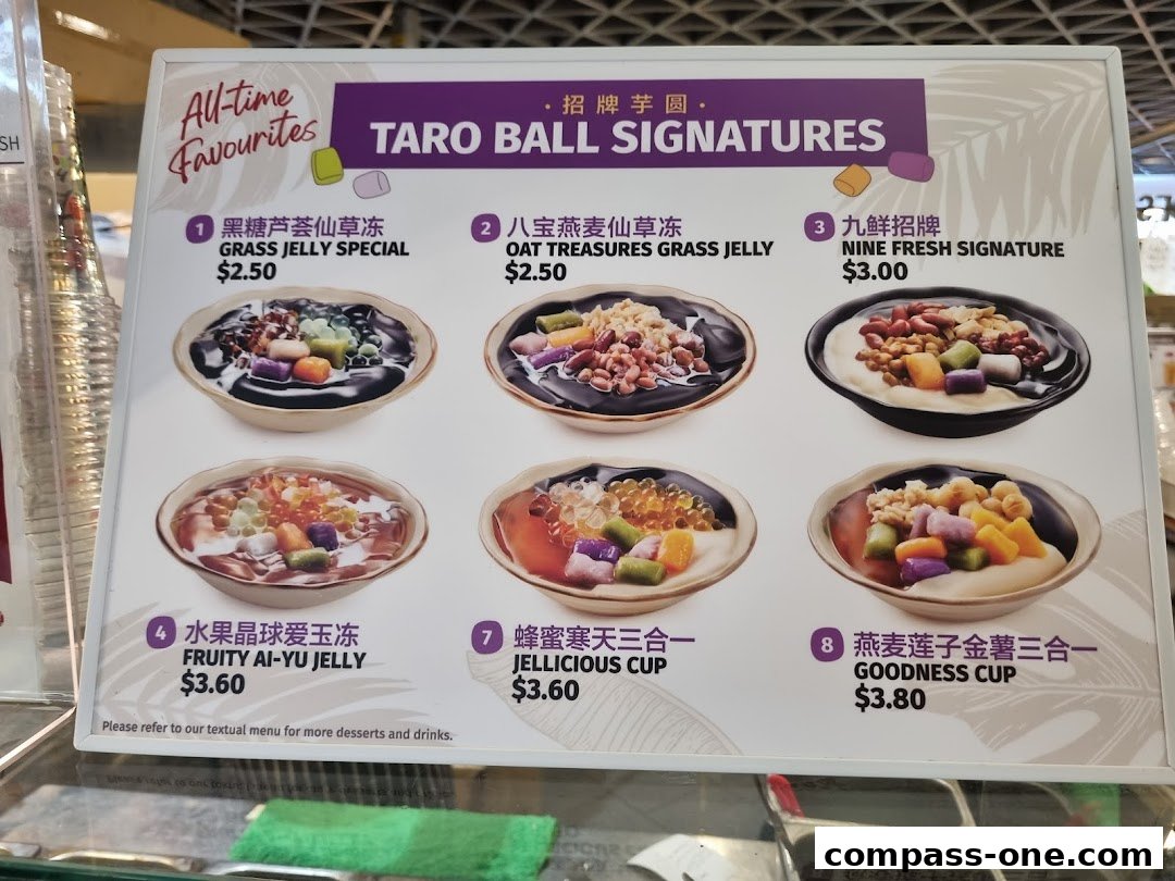 A menu board showcasing various Taro Ball Signature desserts with colorful toppings and prices.