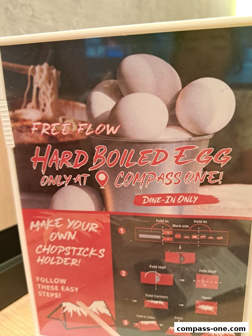 A sign advertising free flow hard-boiled eggs and instructions for making a chopsticks holder.