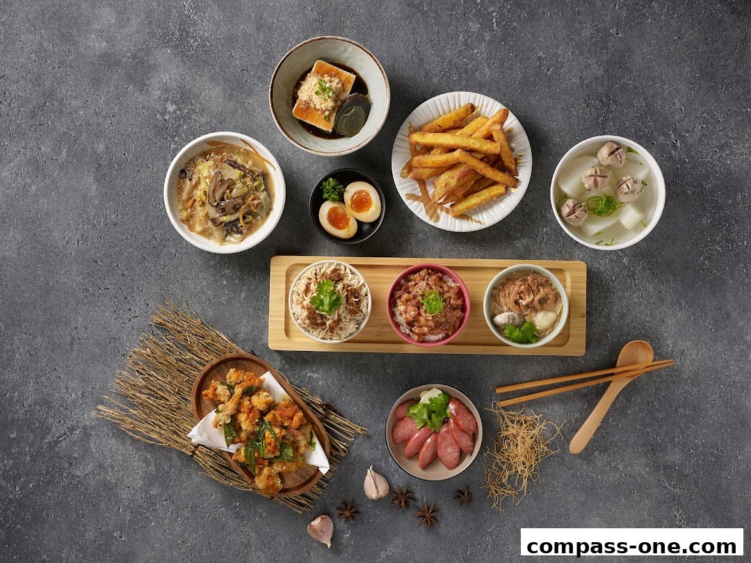 A spread of Taiwanese comfort food dishes, including fried chicken, braised tofu, and various rice bowls.