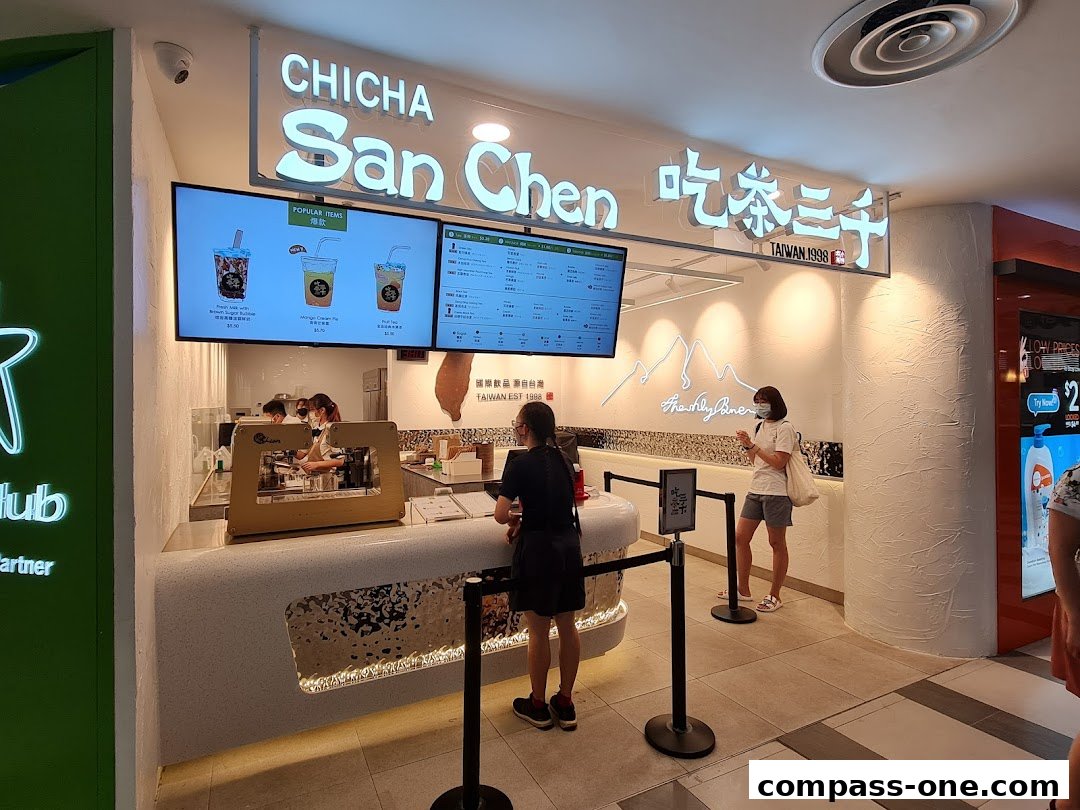 Chicha San Chen bubble tea shop with digital menus displaying popular items.