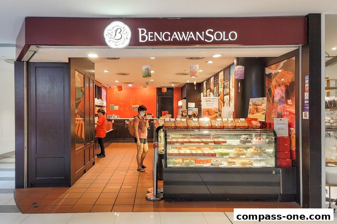 The entrance of Bengawan Solo shop, showcasing a display of cakes and pastries.