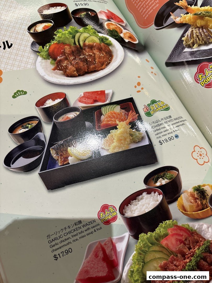 A menu showcasing various Japanese bento boxes and dishes with prices.