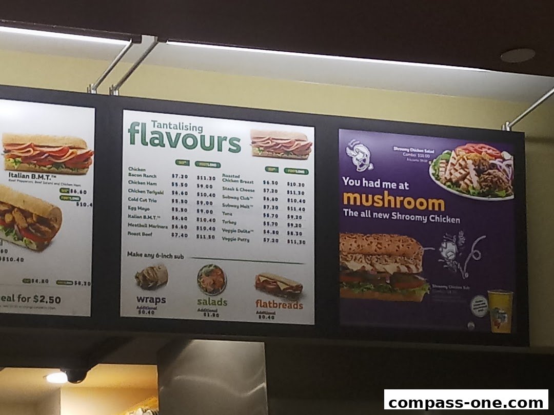 A Subway menu board displaying various sandwich options, prices, and a special promotion.