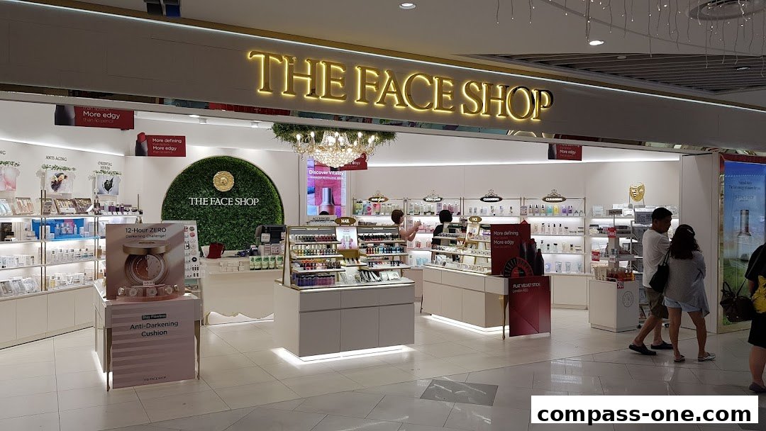 The bright interior of The Face Shop, showcasing makeup and skincare products.