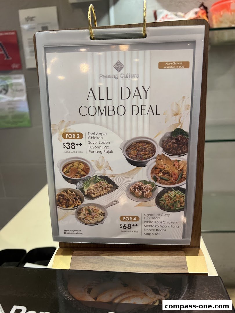 A menu board displays Penang Culture's All Day Combo Deals for two and four people.