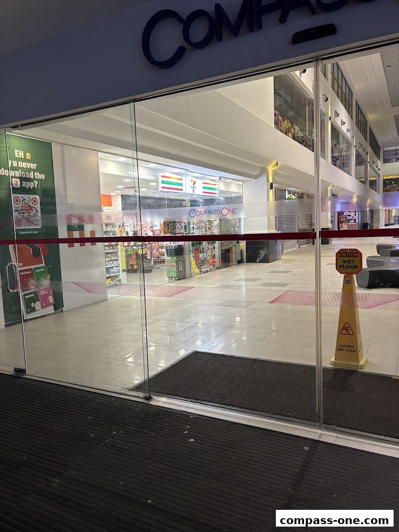 The entrance to a 7-Eleven convenience store located in Compass One mall.