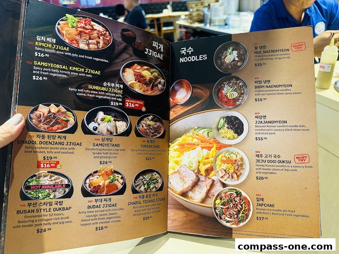 A menu from SEORAE JIB Compass One featuring Korean stews and noodle dishes.