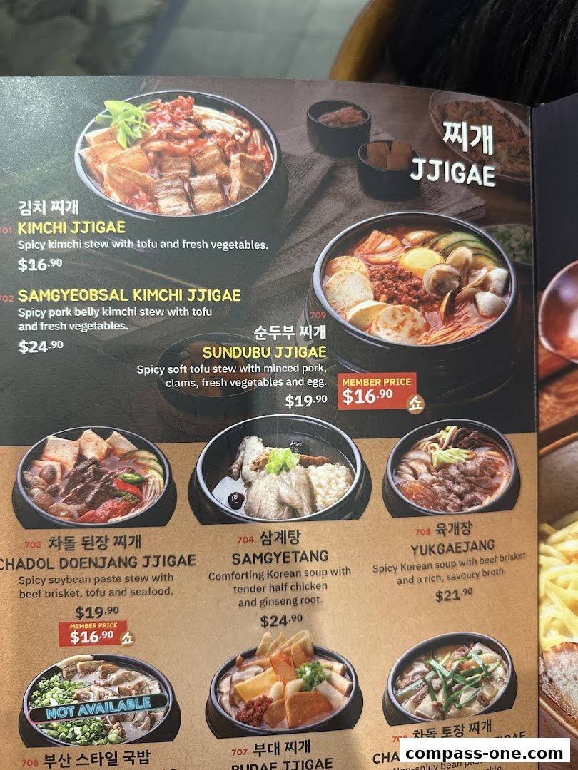 A menu showcasing various Korean stews and soups with appetizing images and descriptions.