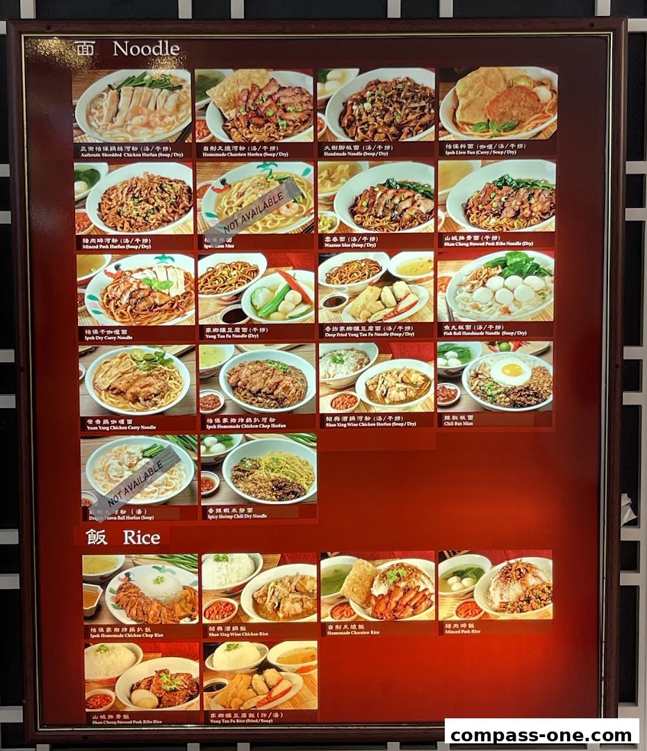 A menu board displaying various noodle and rice dishes with images and descriptions.
