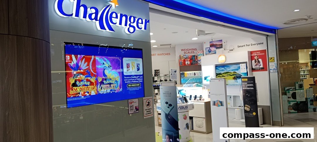 The Challenger store entrance displays a large screen promoting Pokemon games and various electronic products.