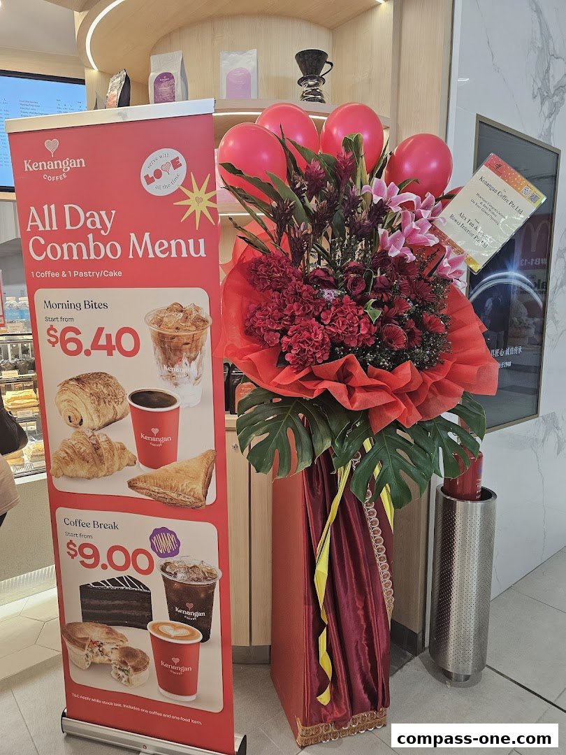 A promotional banner for Kenangan Coffee's All Day Combo Menu with a floral arrangement.