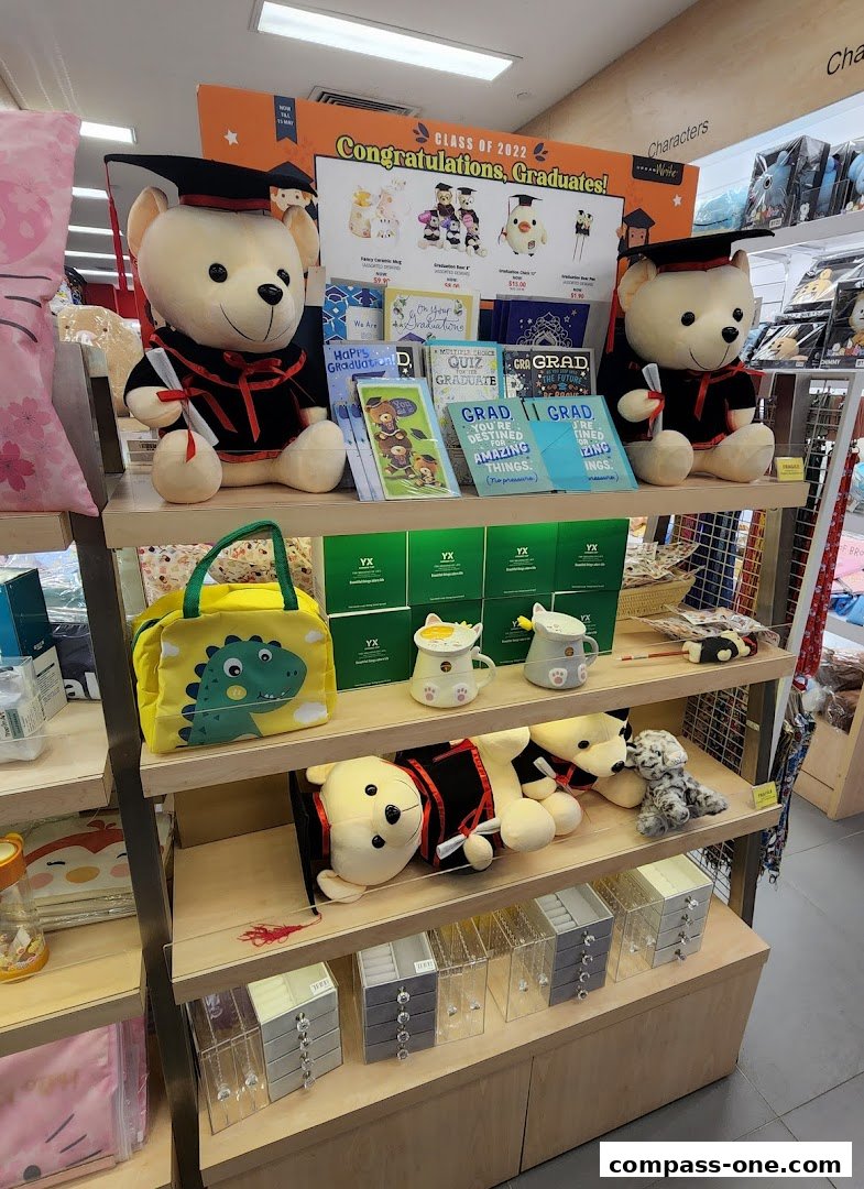 POPULAR Bookstore displays graduation-themed gifts including teddy bears, cards, and mugs.