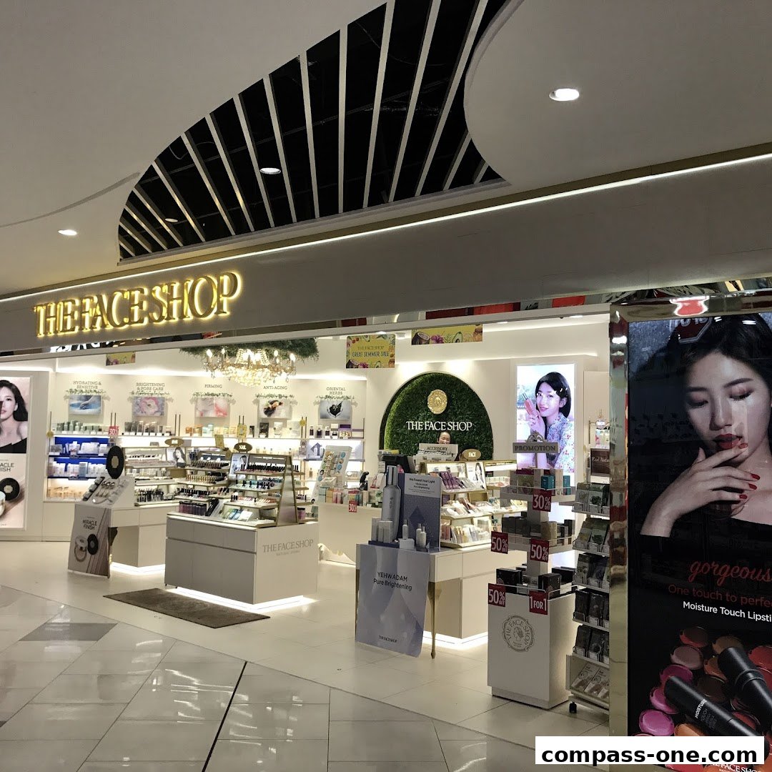 The Face Shop store interior showcasing various skincare and makeup products with promotional signage.